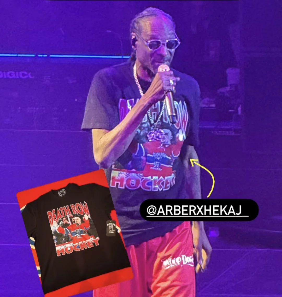 Snoop Dogg wearing an Arber Xhekaj shirt at his concert in Montreal Snoop Dogg wearing an Arber Xhekaj shirt at his concert in Montreal